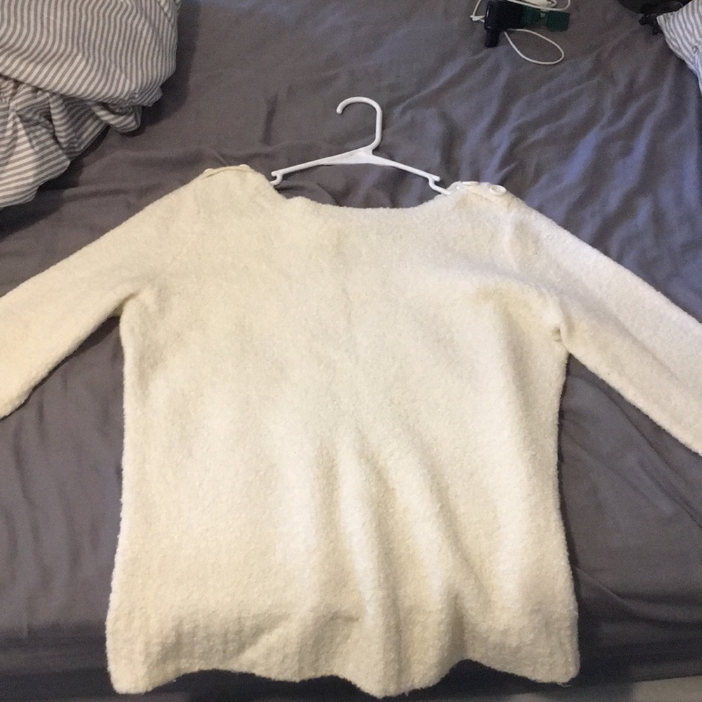 fuzzy white sweater